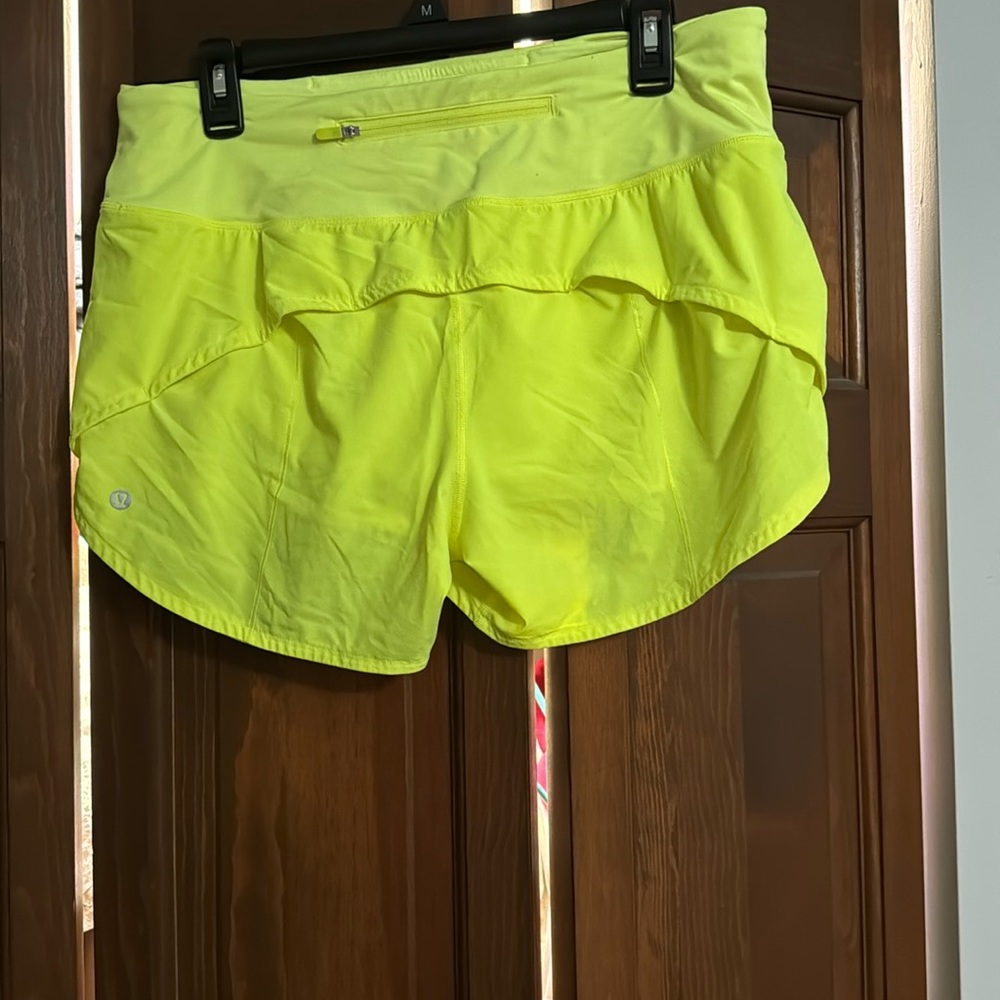 neon yellow lululemon speed up shorts size 10 4 in